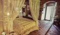 Monolocale-agriturismo-letto-baldacchino-1-p0j74ekcdw2ubwfp37qsf2u1an4uf6kwzxitvemz6e
